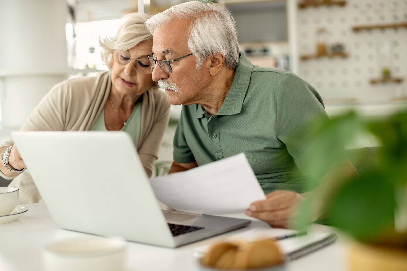 senior-couple-analyzing-their-savings-while-going-through-home-finances-1-scaled.jpg